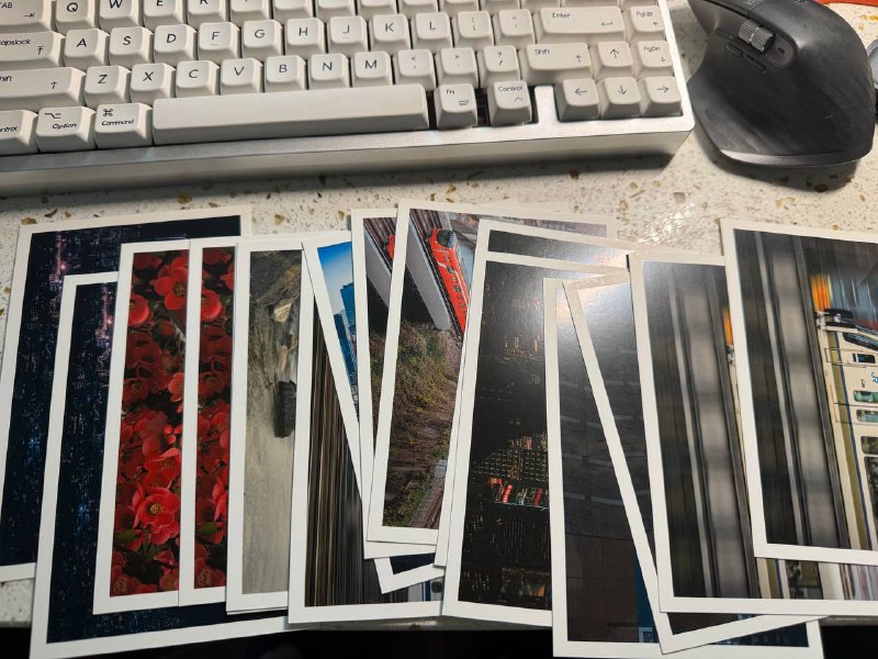 从自己的摄影集里扒了几张图做了明信片，扣1送